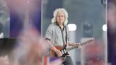 Queen guitarist Brian May among those receiving honours at Buckingham Palace