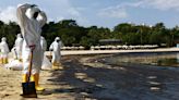 Singapore races to clean up beaches after oil spill