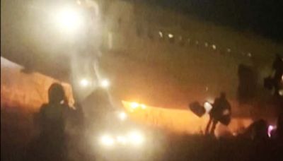 Boeing 737 catches fire and skids off the runway at a Senegal airport, injuring 10