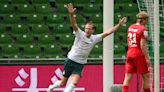 Soccer-Dortmund sign Bundesliga top scorer Fuellkrug on three-year deal