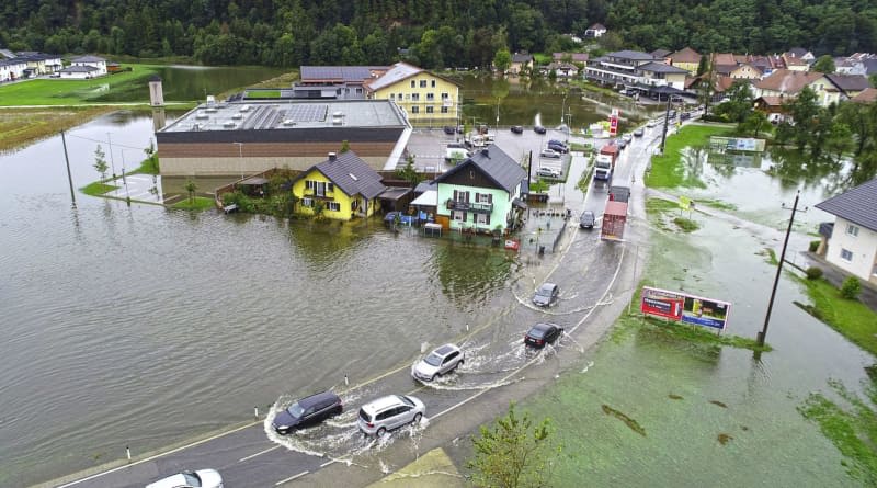 Austria flood waters ease but risk of dam failures, landslides remain