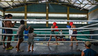 Bare-bones gym breeds Olympians in Philippines boxing capital Bago