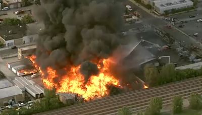 Chicago fire crews battle massive blaze at West Town pallet yard | LIVE