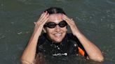 Paris mayor dips into the Seine River to showcase its improved cleanliness before Olympic events