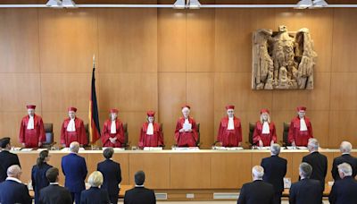 Top German court faults part of a plan to solve the country's problem of too many lawmakers - ET LegalWorld
