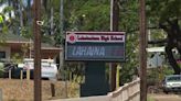 Lahainaluna High School students walk the stage after enduring rough 4 years