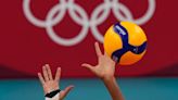Why does one volleyball player wear a different color jersey at the Olympics?