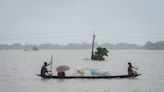 Floods and landslides triggered by heavy rains in India's northeast kill at least 16 people