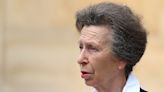 Princess Anne is back to business in shimmering lipstick and power suit