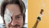 A man who popped a champagne cork into his eye says it felt like being poked 'times a thousand'