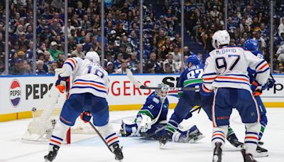Bouchard scores in OT to lift Oilers to 4-3 win over Canucks in Game 2 to even playoff series