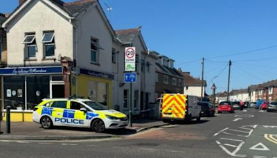 Cafe cordoned off by police as forensics examine inside