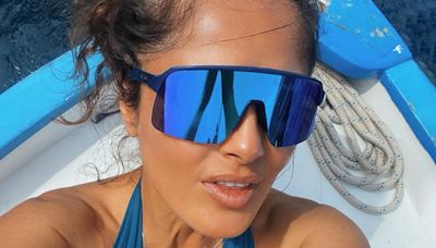 Salma Hayek looks like she's aging backwards in a blue swimsuit during boat ride