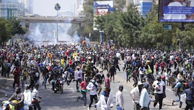 Anti-tax protesters storm Kenya’s parliament, drawing police fire as president vows to quash unrest