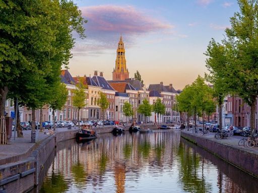 Skip the tourist traps and high prices in Amsterdam — take a short train ride to this beautiful gem instead