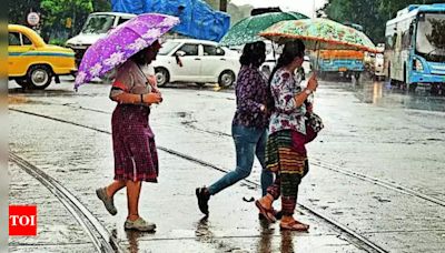 Heavy rain disrupts normal life in Kolkata; IMD predicts more showers across West Bengal | Kolkata News - Times of India