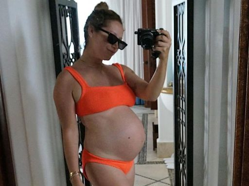 Pregnant Ashley Tisdale Poses in Neon Bikini as She Shares Snaps from Babymoon: 'Trip Was a Success'