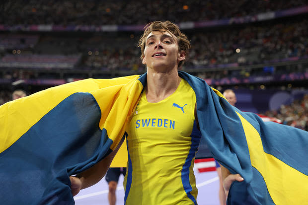 American Mondo Duplantis breaks pole vaulting record competing for Sweden at the Olympics