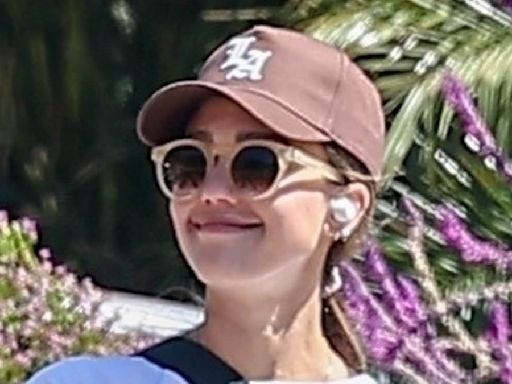 Jessica Alba shows off her fit figure while she enjoys a walk