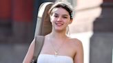 Suri Cruise, 18, flexes musical interest after ditching her dad's surname