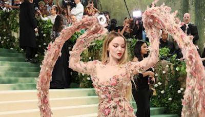 Dove Cameron's 2024 Met Gala dress has sleeves that trail all along the floor