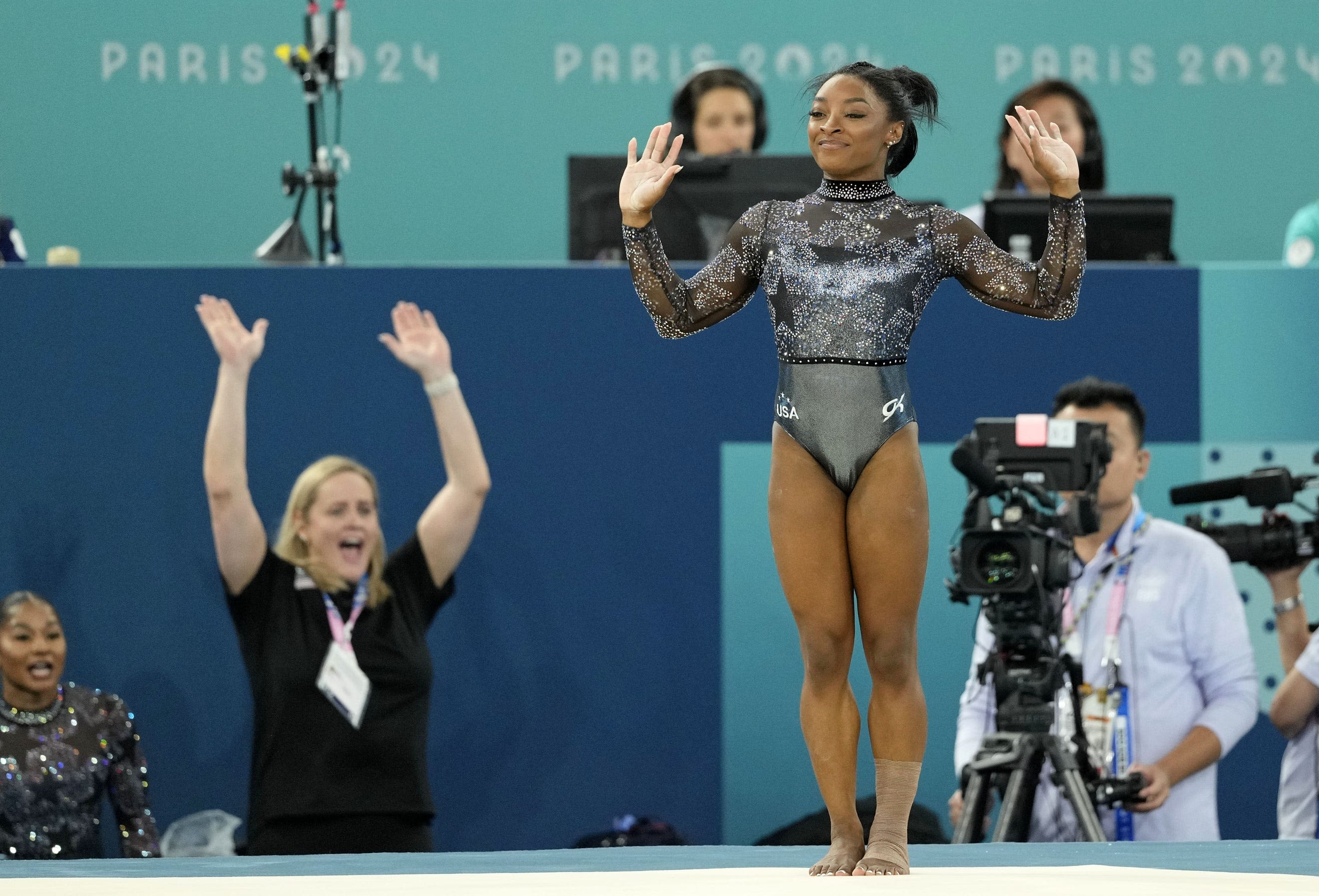 Olympic gymnastics live updates: Simone Biles keeps competing after tweaking her ankle