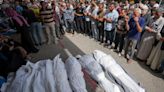Israel’s leaders air wartime divisions as airstrike kills 20 in central Gaza