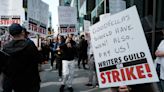 WGA West Issues “Call To Action” To Curb Media Consolidation: “One Of The Root Causes” Of The Strike