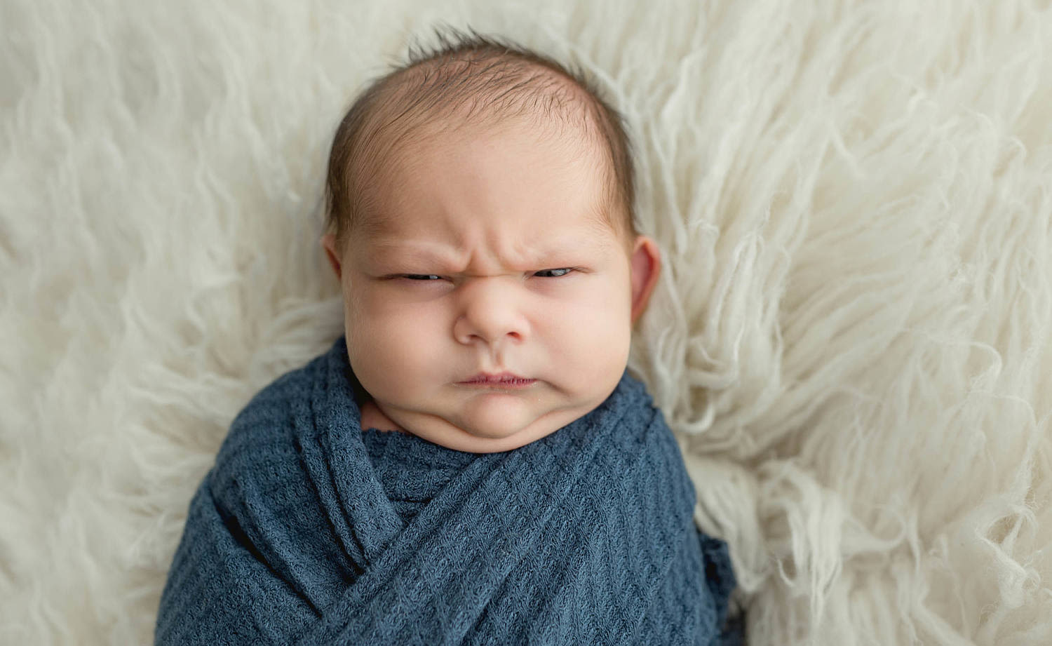 This newborn baby is going viral for his many grumpy faces: See all the pics