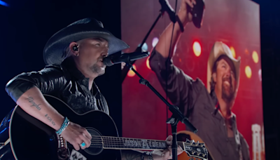 Jason Aldean Tributes Toby Keith With A Heartbreakingly Beautiful Cover Of "Should've Been A Cowboy"