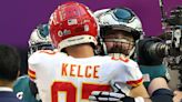 Travis and Jason Kelce Share a Big Brotherly Hug on the Super Bowl Field Prior to Kick Off