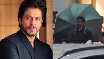 Shah Rukh Khan back to Mumbai; hides behind umbrella post-release from hospital for heat stroke. Watch