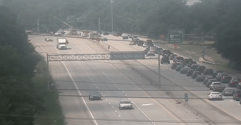 I-77 reopened after dump truck flips, spills gravel in roadway