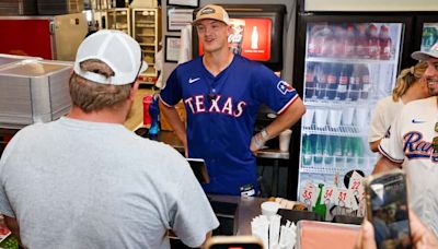 Order up! See photos as Texas Rangers Josh Jung, Josh Smith work a shift at Hurtado Barbecue