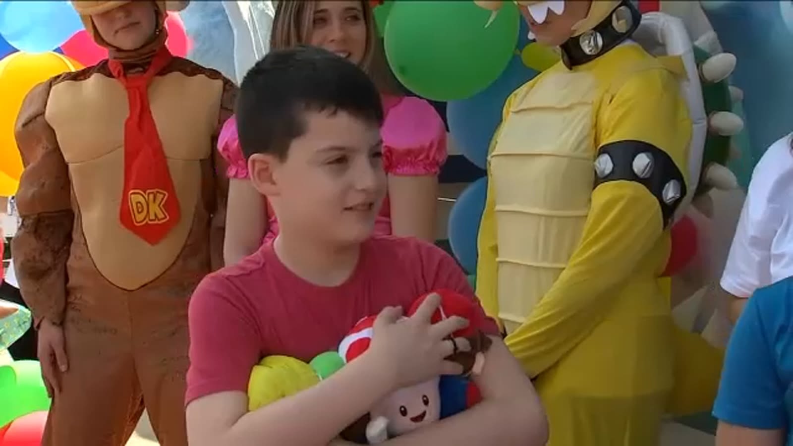 Morganville boy battling critical illness surprised with Make-A-Wish trip to Nintendo World