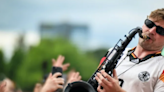 German fans dance to the tune of the 'saxophone guy'