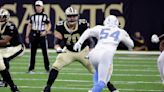 Rookie Saints left tackle Trevor Penning carted off vs. Chargers with left foot injury