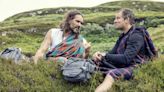 Russell Brand embraces Bear Grylls in new photo from River Thames baptism