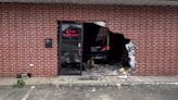 Deputies investigating after SUV crashes into Garland County massage parlor