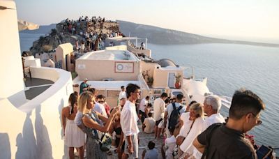 Santorini locals hide in their houses to avoid tourism chaos