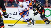 Islanders snap long losing streak with 5-4 shootout win over Flames