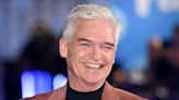 Smiley Phillip Schofield spotted with wife and daughters as they arrive at Grand Prix in style