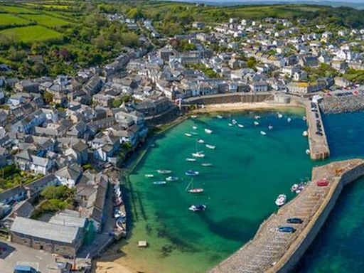 'Loveliest village in the UK' with sandy beach postcard'