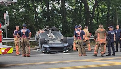 Rollover crash closes River Road