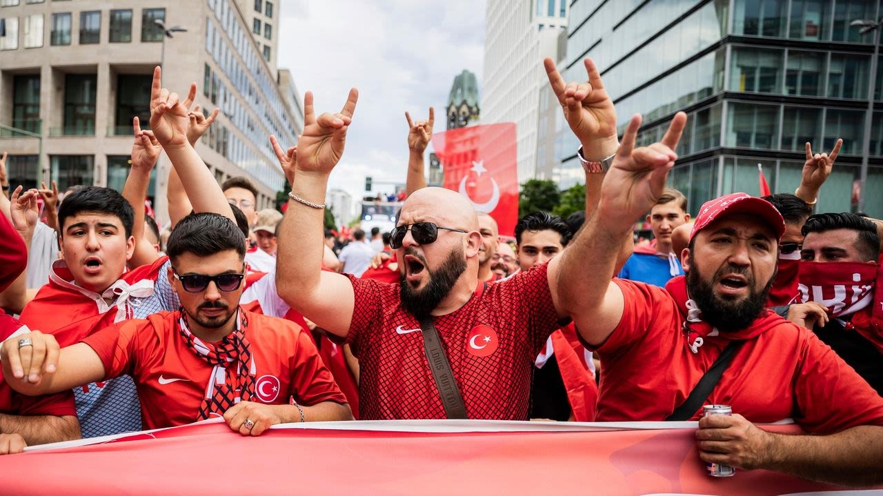 Turkey supporters make controversial hand gesture on way to stadium and in it for Euro 2024 match