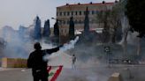 Tear gas, clashes as Lebanon protesters try to storm govt HQ