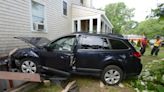 Car hits Harwich home, two sent to hospital
