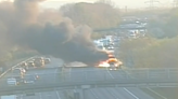 Lorry ablaze on M56 as crews tackle 'thick smoke'