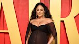 Vanessa Hudgens proudly displays baby bump in tight brown dress for date night