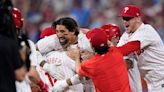 Phillies rally over final two innings to stun Padres